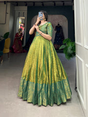 A joyful festive mood with Kanjivaram and zari weaving work appliqued gown